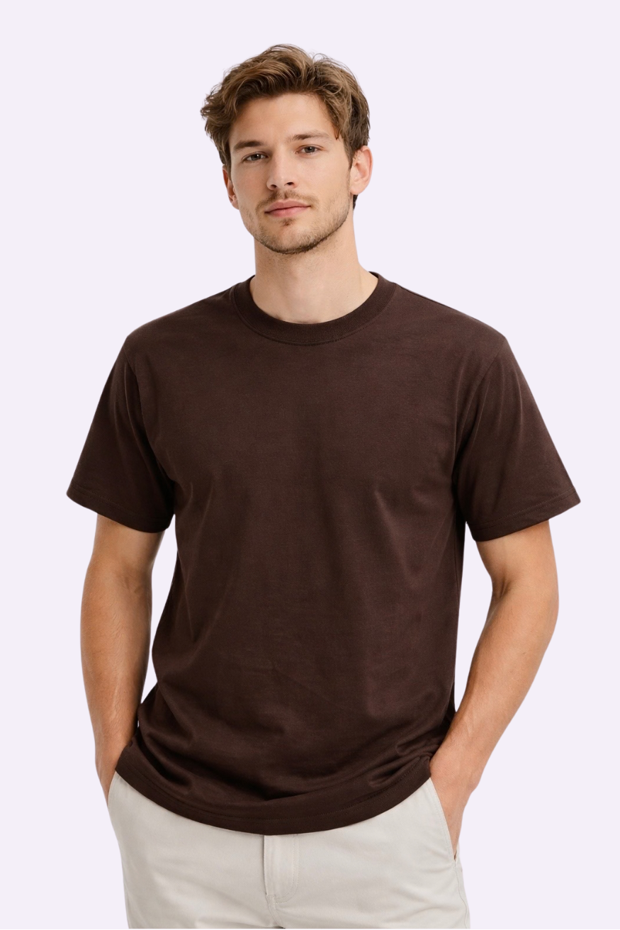 Man wearing a brown t-shirt against a white background