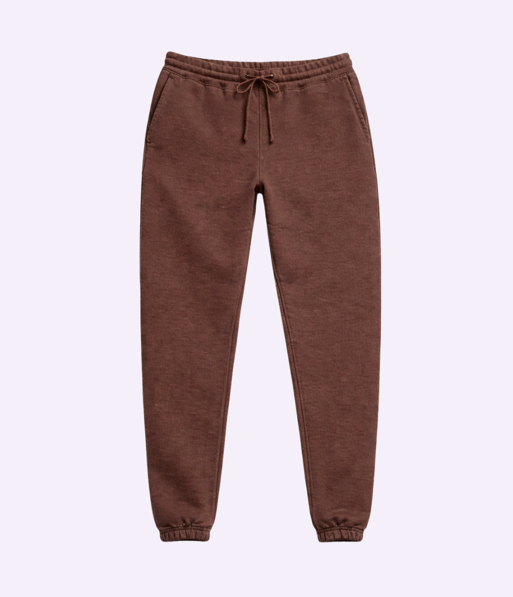 Brown sweatpants on a light purple background